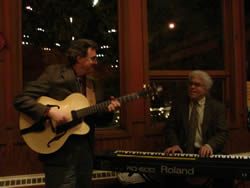 Lynn playing the second guitar he built. Paul Kimball joining him on piano at the Red Newt Bistro.
